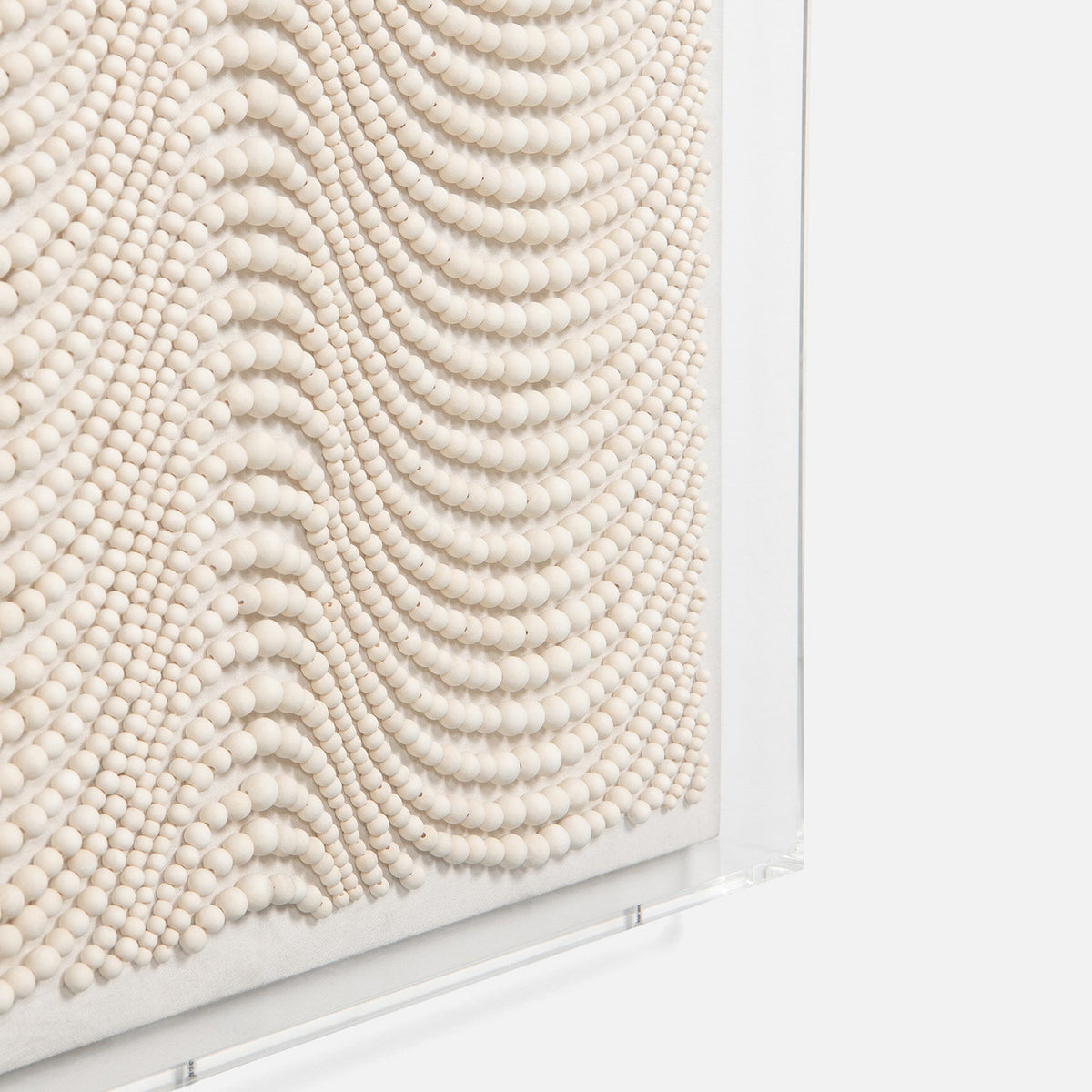 White wood bead detail of Rheta artwork