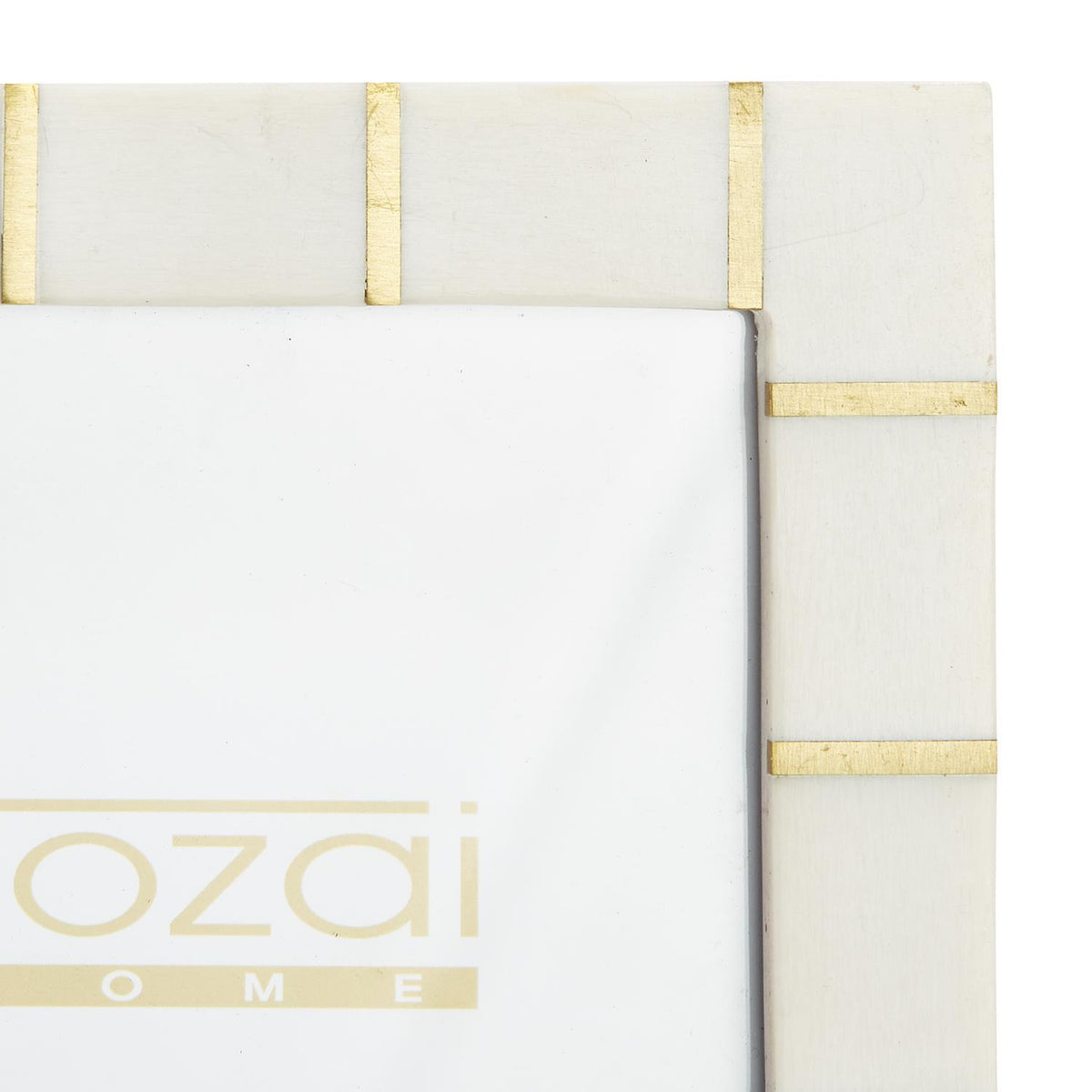 Corner of resin and brass photo frame