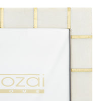 Corner of resin and brass photo frame