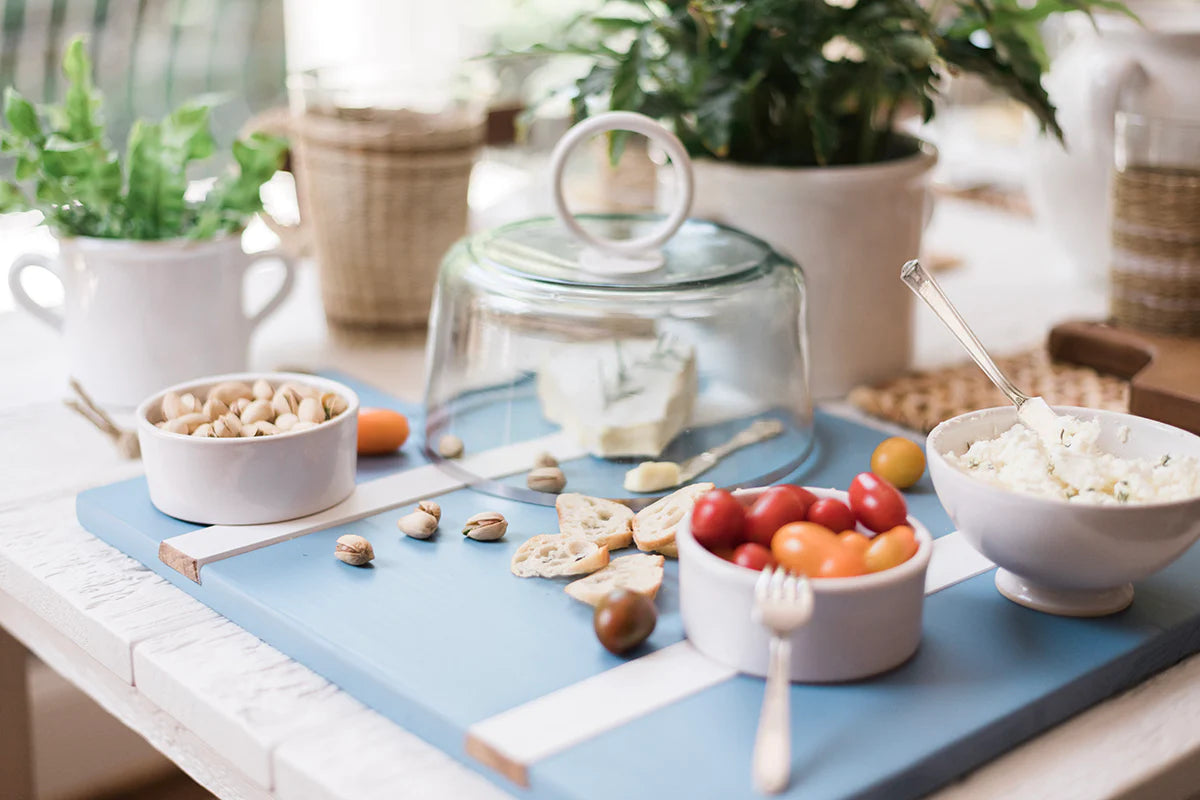 Charcuterie on French blue and white rectangular serving board