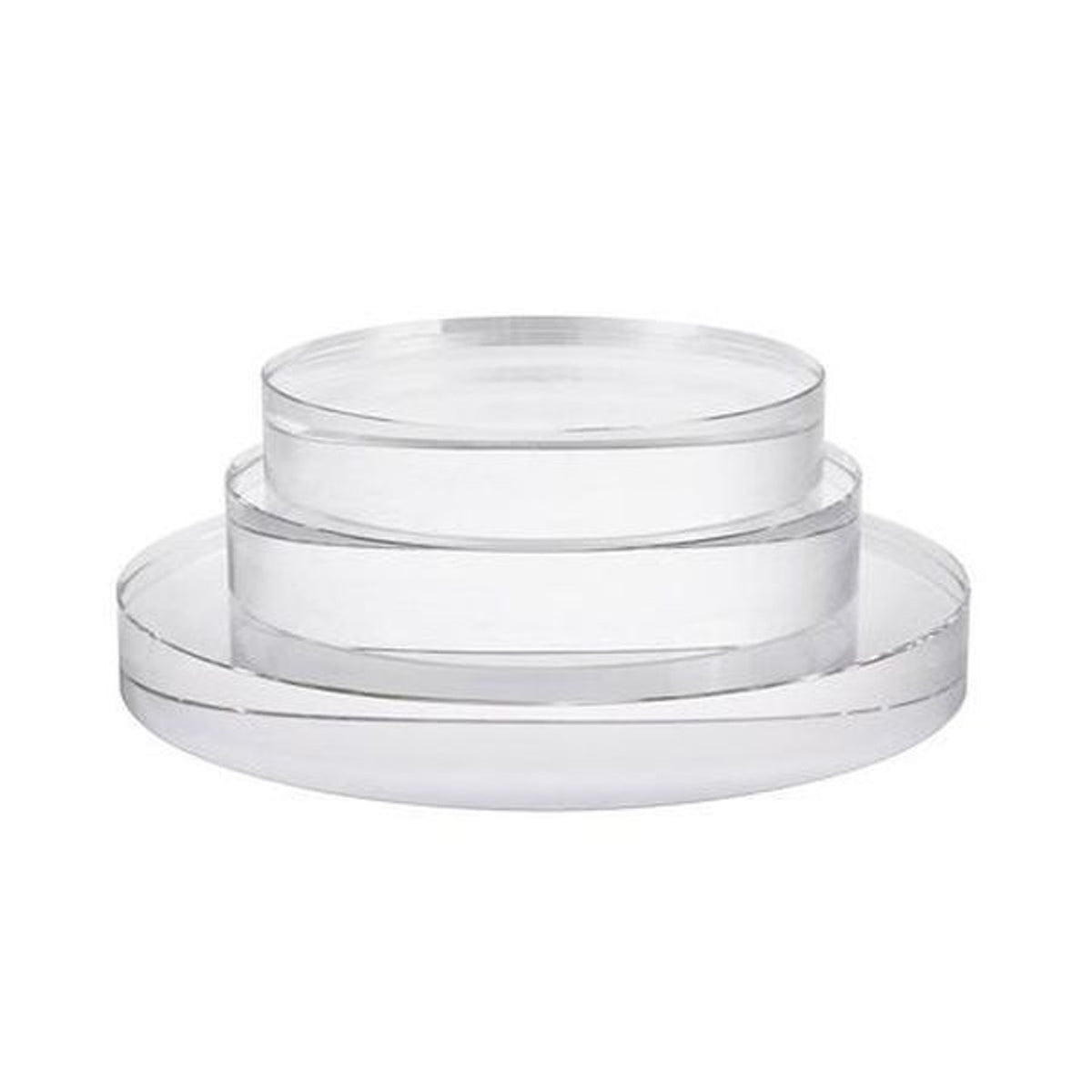 Three sizes of clear acrylic risers