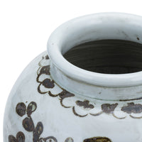 Mouth of small brown plum blossom jar