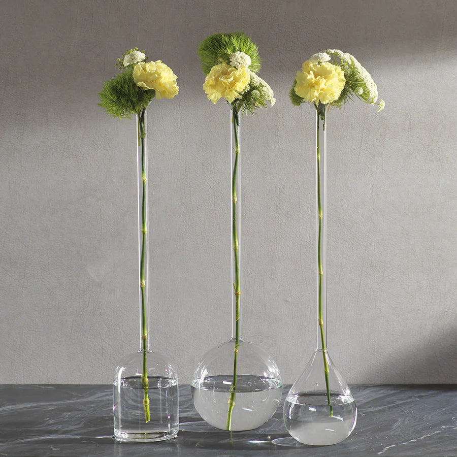 Three clear glass stem vases