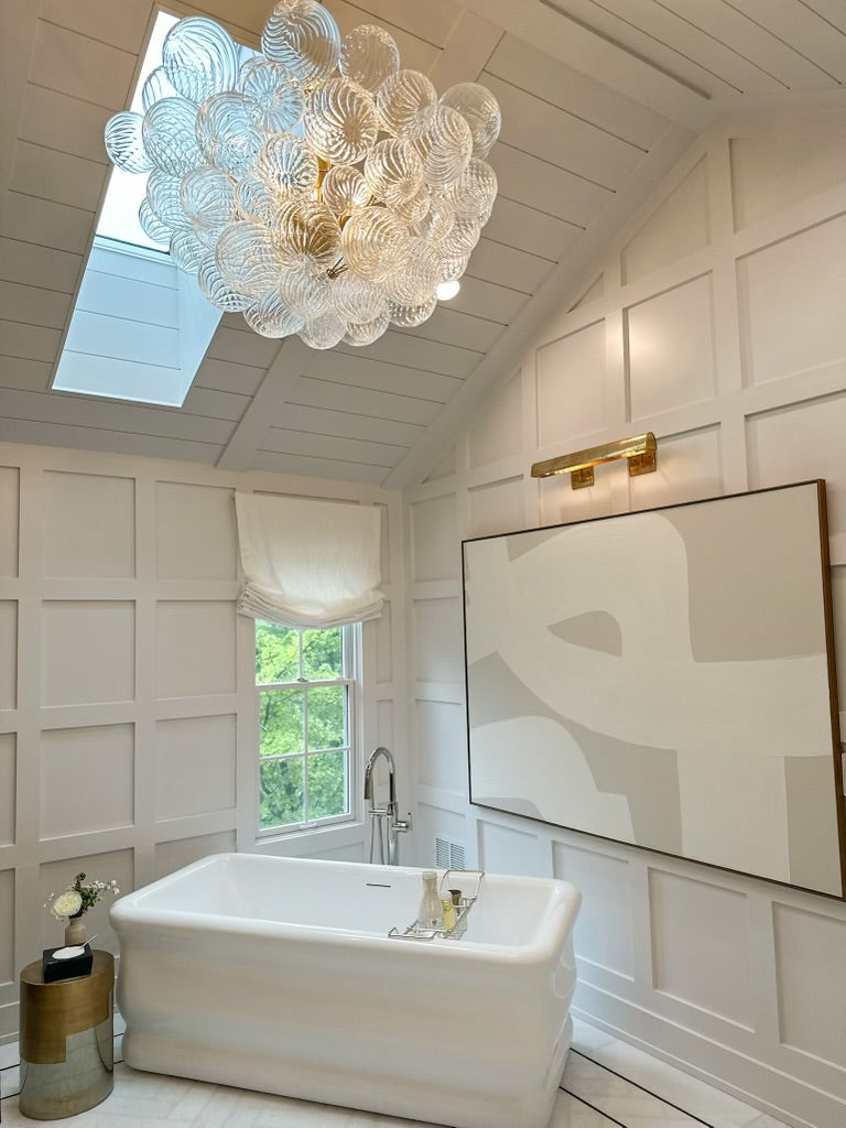 Talia gild and clear glass large chandelier in bathroom