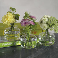 Set of three unique vases with flowers
