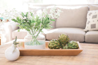 White colorblock flower vase on coffee table